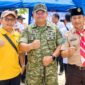Foto: Dandim 0827/Sumenep Letkol Inf. Citra Persada (tengah) bersama jajaran Perhutani KPH Madura dan tokoh Kepramukaan saat mengepalkan tangan salam komando sebagai simbol komitmen sinergi pengamanan lingkungan di Kabupaten Sumenep.