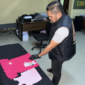 Foto: Petugas Unit Perlindungan Perempuan dan Anak (PPA) Satreskrim Polresta Sumenep saat menggelar barang bukti berupa pakaian yang berkaitan dengan perkara dugaan pencabulan anak.