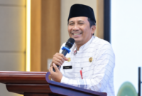 Foto: Kepala Dinas Koperasi, Usaha Mikro, Perindustrian dan Perdagangan (DKUPP) Sumenep Moh. Ramli saat memberikan sambutan dan arahan dalam sarasehan UMKM gagasan PWI Sumenep di Aula Jaga Temba UNIBA Madura.